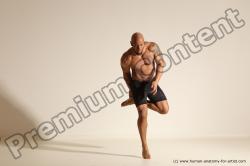 Underwear Gymnastic poses Man Black Muscular Bald Dancing Dynamic poses Academic